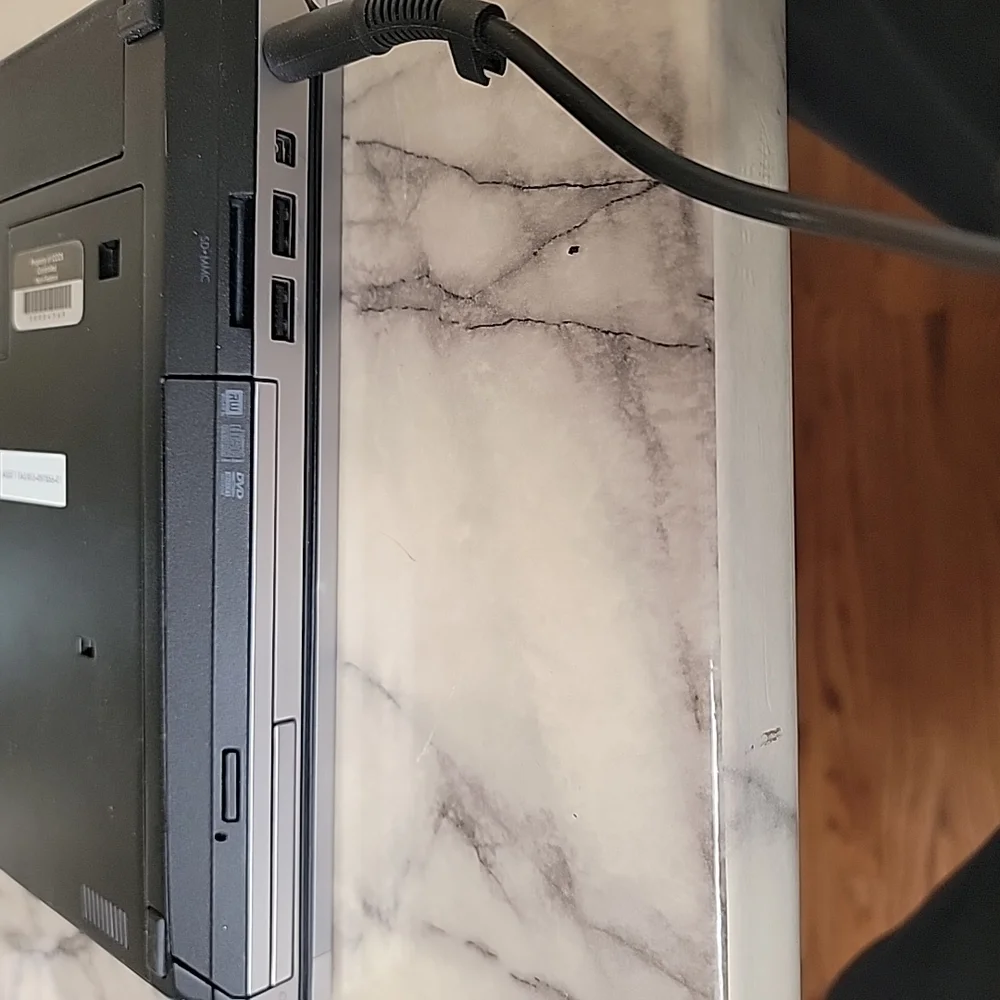 HP Silver and Black Laptop with Sleek Design and QWERTY Keyboard
